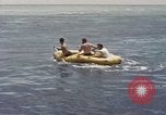 Image of Submarine, USS Cod, rescuing crew of Dutch submarine, O-19 Spratly Islands, 1945, second 41 stock footage video 65675076085