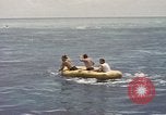 Image of Submarine, USS Cod, rescuing crew of Dutch submarine, O-19 Spratly Islands, 1945, second 42 stock footage video 65675076085