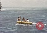 Image of Submarine, USS Cod, rescuing crew of Dutch submarine, O-19 Spratly Islands, 1945, second 43 stock footage video 65675076085