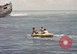 Image of Submarine, USS Cod, rescuing crew of Dutch submarine, O-19 Spratly Islands, 1945, second 45 stock footage video 65675076085