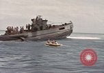 Image of Submarine, USS Cod, rescuing crew of Dutch submarine, O-19 Spratly Islands, 1945, second 48 stock footage video 65675076085