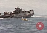 Image of Submarine, USS Cod, rescuing crew of Dutch submarine, O-19 Spratly Islands, 1945, second 49 stock footage video 65675076085
