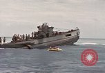Image of Submarine, USS Cod, rescuing crew of Dutch submarine, O-19 Spratly Islands, 1945, second 51 stock footage video 65675076085
