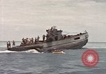 Image of Submarine, USS Cod, rescuing crew of Dutch submarine, O-19 Spratly Islands, 1945, second 55 stock footage video 65675076085