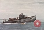 Image of Submarine, USS Cod, rescuing crew of Dutch submarine, O-19 Spratly Islands, 1945, second 60 stock footage video 65675076085