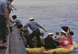 Image of USS Cod rescues crew of Dutch submarine in South China Sea Spratly Islands, 1945, second 4 stock footage video 65675076086
