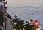 Image of USS Cod rescues crew of Dutch submarine in South China Sea Spratly Islands, 1945, second 10 stock footage video 65675076086