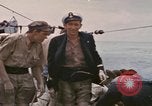 Image of USS Cod rescues crew of Dutch submarine in South China Sea Spratly Islands, 1945, second 14 stock footage video 65675076086