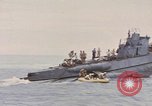 Image of USS Cod rescues crew of Dutch submarine in South China Sea Spratly Islands, 1945, second 34 stock footage video 65675076086