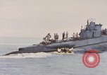 Image of USS Cod rescues crew of Dutch submarine in South China Sea Spratly Islands, 1945, second 36 stock footage video 65675076086