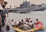 Image of USS Cod rescues crew of Dutch submarine in South China Sea Spratly Islands, 1945, second 45 stock footage video 65675076086