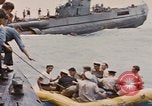 Image of USS Cod rescues crew of Dutch submarine in South China Sea Spratly Islands, 1945, second 46 stock footage video 65675076086