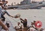 Image of USS Cod rescues crew of Dutch submarine in South China Sea Spratly Islands, 1945, second 48 stock footage video 65675076086