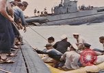 Image of USS Cod rescues crew of Dutch submarine in South China Sea Spratly Islands, 1945, second 52 stock footage video 65675076086