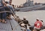 Image of USS Cod rescues crew of Dutch submarine in South China Sea Spratly Islands, 1945, second 54 stock footage video 65675076086