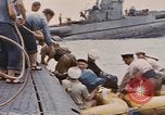 Image of USS Cod rescues crew of Dutch submarine in South China Sea Spratly Islands, 1945, second 57 stock footage video 65675076086