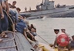 Image of USS Cod rescues crew of Dutch submarine in South China Sea Spratly Islands, 1945, second 58 stock footage video 65675076086