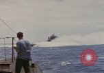 Image of USS Cod (SS-224) rescuing crew from Dutch submarine (O-19) Spratly Islands, 1945, second 4 stock footage video 65675076087