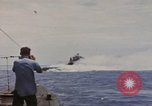 Image of USS Cod (SS-224) rescuing crew from Dutch submarine (O-19) Spratly Islands, 1945, second 6 stock footage video 65675076087