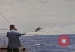 Image of USS Cod (SS-224) rescuing crew from Dutch submarine (O-19) Spratly Islands, 1945, second 8 stock footage video 65675076087