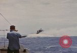 Image of USS Cod (SS-224) rescuing crew from Dutch submarine (O-19) Spratly Islands, 1945, second 9 stock footage video 65675076087