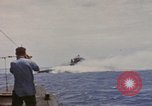 Image of USS Cod (SS-224) rescuing crew from Dutch submarine (O-19) Spratly Islands, 1945, second 10 stock footage video 65675076087