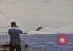 Image of USS Cod (SS-224) rescuing crew from Dutch submarine (O-19) Spratly Islands, 1945, second 11 stock footage video 65675076087