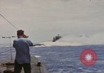 Image of USS Cod (SS-224) rescuing crew from Dutch submarine (O-19) Spratly Islands, 1945, second 12 stock footage video 65675076087
