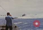 Image of USS Cod (SS-224) rescuing crew from Dutch submarine (O-19) Spratly Islands, 1945, second 13 stock footage video 65675076087