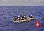 Image of USS Cod (SS-224) rescuing crew from Dutch submarine (O-19) Spratly Islands, 1945, second 29 stock footage video 65675076087