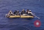 Image of USS Cod (SS-224) rescuing crew from Dutch submarine (O-19) Spratly Islands, 1945, second 33 stock footage video 65675076087