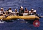 Image of USS Cod (SS-224) rescuing crew from Dutch submarine (O-19) Spratly Islands, 1945, second 37 stock footage video 65675076087