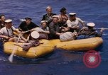 Image of USS Cod (SS-224) rescuing crew from Dutch submarine (O-19) Spratly Islands, 1945, second 38 stock footage video 65675076087