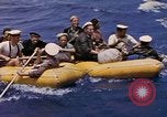 Image of USS Cod (SS-224) rescuing crew from Dutch submarine (O-19) Spratly Islands, 1945, second 39 stock footage video 65675076087