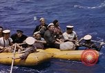 Image of USS Cod (SS-224) rescuing crew from Dutch submarine (O-19) Spratly Islands, 1945, second 40 stock footage video 65675076087