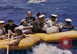 Image of USS Cod (SS-224) rescuing crew from Dutch submarine (O-19) Spratly Islands, 1945, second 42 stock footage video 65675076087