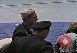 Image of USS Cod (SS-224) rescuing crew from Dutch submarine (O-19) Spratly Islands, 1945, second 48 stock footage video 65675076087