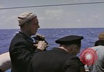 Image of USS Cod (SS-224) rescuing crew from Dutch submarine (O-19) Spratly Islands, 1945, second 49 stock footage video 65675076087