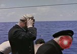 Image of USS Cod (SS-224) rescuing crew from Dutch submarine (O-19) Spratly Islands, 1945, second 51 stock footage video 65675076087