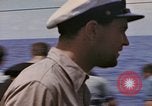 Image of USS Cod (SS-224) rescuing crew from Dutch submarine (O-19) Spratly Islands, 1945, second 53 stock footage video 65675076087