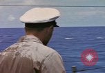 Image of USS Cod (SS-224) rescuing crew from Dutch submarine (O-19) Spratly Islands, 1945, second 54 stock footage video 65675076087