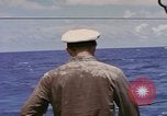Image of USS Cod (SS-224) rescuing crew from Dutch submarine (O-19) Spratly Islands, 1945, second 55 stock footage video 65675076087