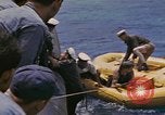 Image of USS Cod (SS-224) rescuing crew from Dutch submarine (O-19) Spratly Islands, 1945, second 58 stock footage video 65675076087
