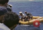 Image of USS Cod (SS-224) rescuing crew from Dutch submarine (O-19) Spratly Islands, 1945, second 61 stock footage video 65675076087