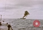 Image of USS Cod (SS-224) fires at Dutch submarine, O-19, to scuttle her Spratly Islands, 1945, second 6 stock footage video 65675076089