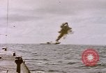 Image of USS Cod (SS-224) fires at Dutch submarine, O-19, to scuttle her Spratly Islands, 1945, second 7 stock footage video 65675076089