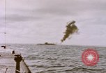 Image of USS Cod (SS-224) fires at Dutch submarine, O-19, to scuttle her Spratly Islands, 1945, second 9 stock footage video 65675076089