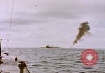 Image of USS Cod (SS-224) fires at Dutch submarine, O-19, to scuttle her Spratly Islands, 1945, second 12 stock footage video 65675076089