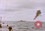 Image of USS Cod (SS-224) fires at Dutch submarine, O-19, to scuttle her Spratly Islands, 1945, second 13 stock footage video 65675076089