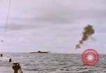 Image of USS Cod (SS-224) fires at Dutch submarine, O-19, to scuttle her Spratly Islands, 1945, second 15 stock footage video 65675076089